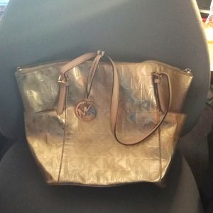 Gold metallic Michael Kors purse